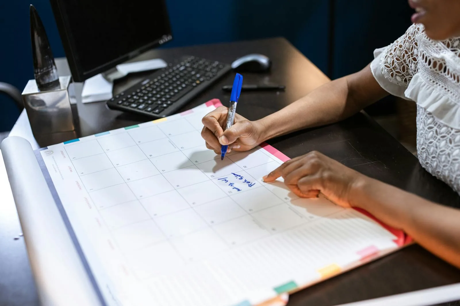 An open planner and calendar on a tidy desk for scheduling preventive care